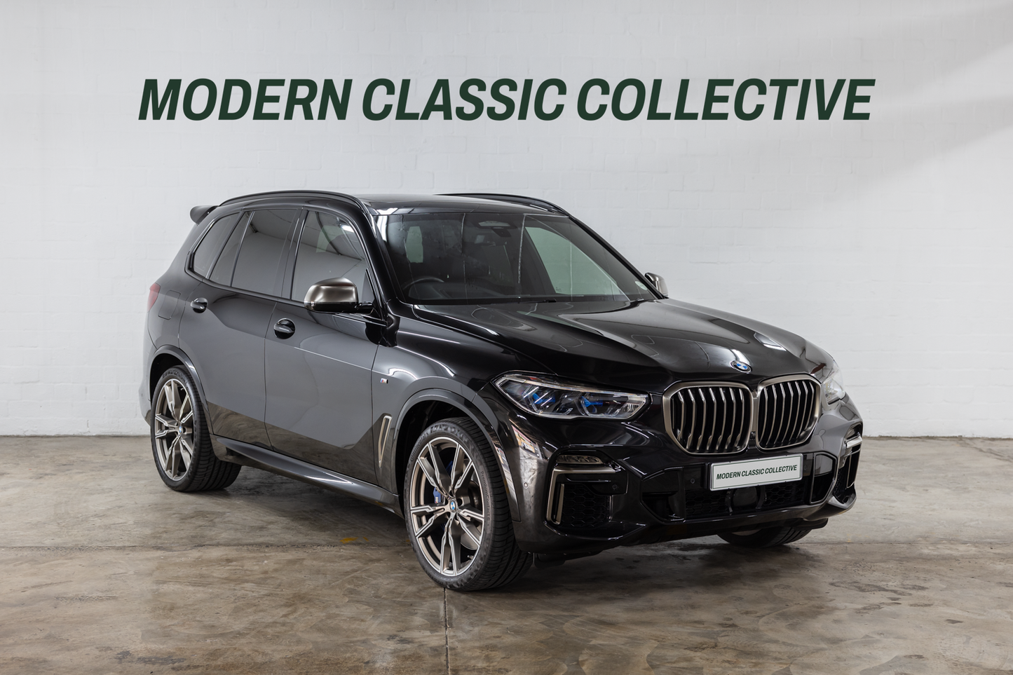 2020 Black BMW X5 M50i showing laser lights and grille