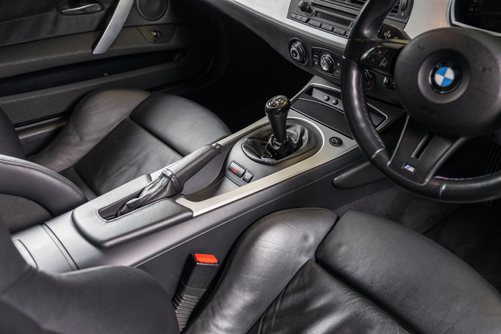 Interior of a BMW Z4 M Coupe showing a manual gear leaver 